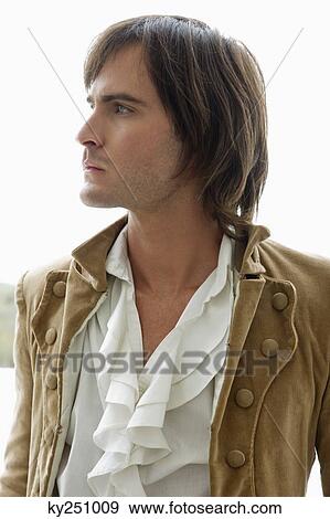 Close-up of a man thinking View Large Photo Image Stock Photo - Close-up of a man thinking. Fotosearch
