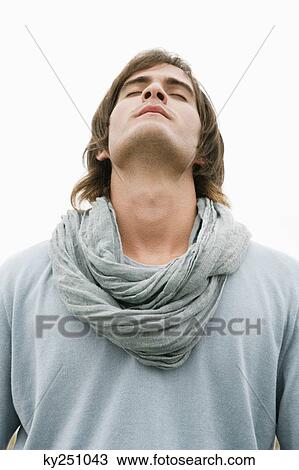 Close-up of a man with his eyes closed View Large Photo Image Stock Image - Close-up of a man with his eyes closed. Fotosearch