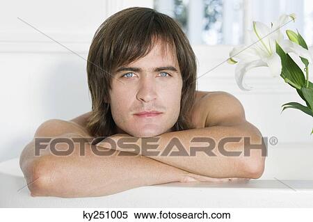 Portrait of a man in a bathtub View Large Photo Image Stock Photography - Portrait of a man in a bathtub. Fotosearch