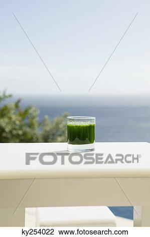 Close-up of a glass of pea soup View Large Photo Image Stock Image - Close-up of a glass of pea soup. Fotosearch