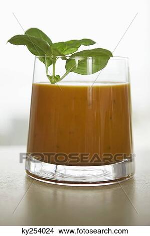 Close-up of a glass of sauce with mint leaf View Large Photo Image Picture - Close-up of a glass of sauce with mint leaf. Fotosearch