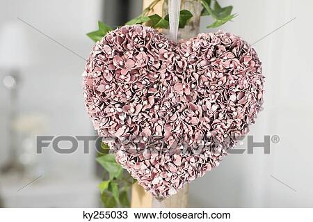Close-up of heart shape decorated petals in a bedroom View Large Photo Image Stock Image - Close-up of heart shape decorated petals in a bedroom. Fotosearch