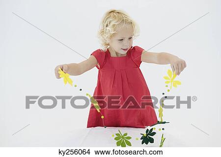 Girl playing with a streamer View Large Photo Image Picture - Girl playing with a streamer. Fotosearch