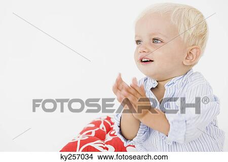 Baby boy clapping View Large Photo Image Picture - Baby boy clapping. Fotosearch