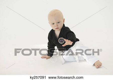 Baby boy reaching for a soap bubble View Large Photo Image Stock Image - Baby boy reaching for a soap bubble. Fotosearch
