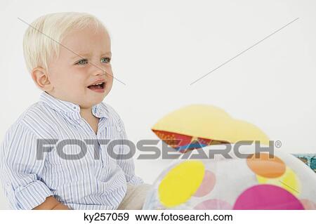 Stock Photo - Close-up of a baby boy crying. Fotosearch