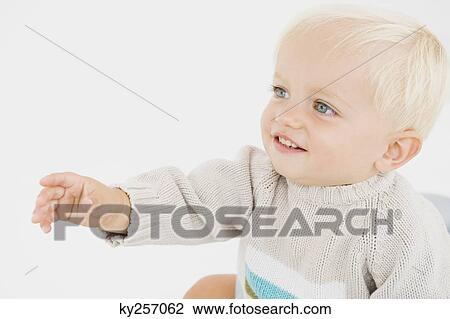 Close-up of a baby boy View Large Photo Image Stock Image - Close-up of a baby boy. Fotosearch