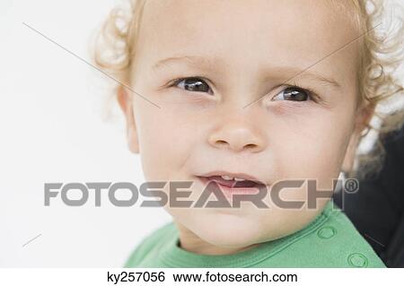 Close-up of a baby boy View Large Photo Image Stock Photograph - Close-up of a baby boy. Fotosearch