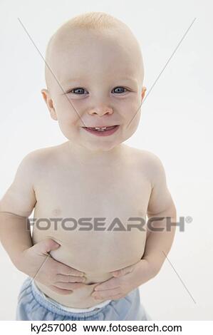 Portrait of a baby boy smiling View Large Photo Image Stock Photo - Portrait of a baby boy smiling. Fotosearch