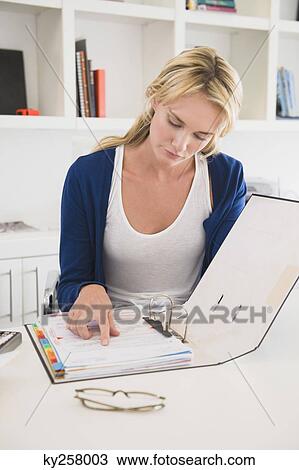 Businesswoman choosing color swatches View Large Photo Image Stock Image - Businesswoman choosing color swatches. Fotosearch