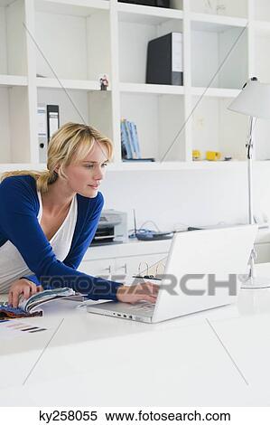 Businesswoman choosing color swatches View Large Photo Image Stock Photography - Businesswoman choosing color swatches. Fotosearch