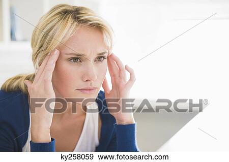 Close-up of a woman with head in hands View Large Photo Image Stock Photo - Close-up of a woman with head in hands. Fotosearch