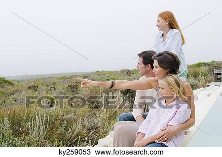 Family admiring the view View Large Photo Image Stock Image - Family admiring the view. Fotosearch