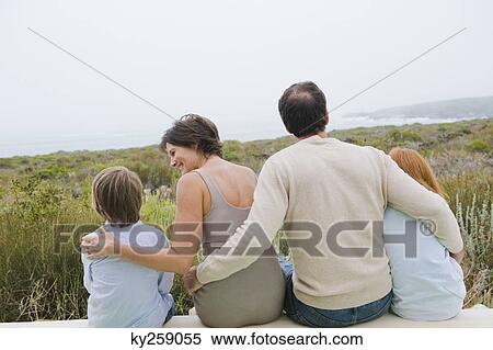 Stock Photography - Family enjoying vacations. Fotosearch