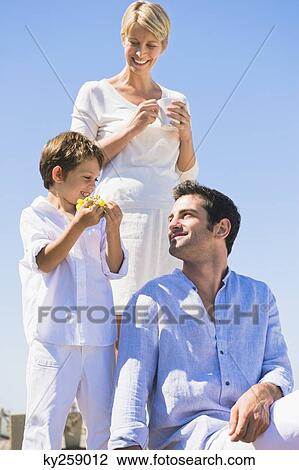 Family on vacations on the beach View Large Photo Image Stock Image - Family on vacations on the beach. Fotosearch