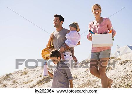 Family on vacations on the beach View Large Photo Image Picture - Family on vacations on the beach. Fotosearch
