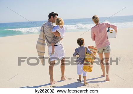Family on vacations on the beach View Large Photo Image Stock Image - Family on vacations on the beach. Fotosearch