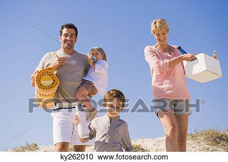 Family on vacations on the beach View Large Photo Image Stock Image - Family on vacations on the beach. Fotosearch