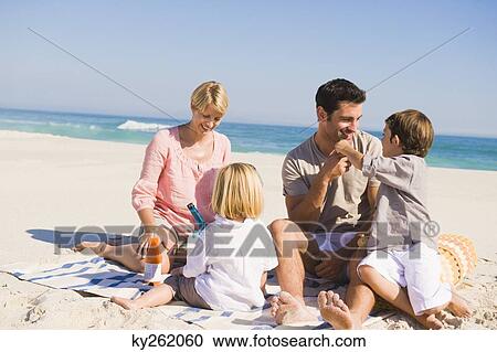 Family on vacations on the beach View Large Photo Image Stock Image - Family on vacations on the beach. Fotosearch