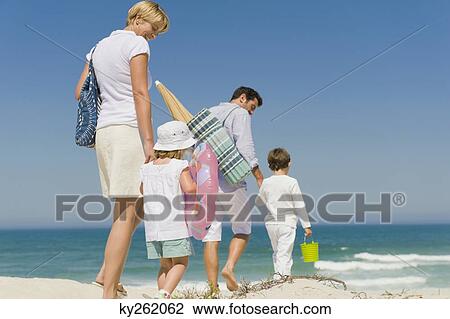 Family on vacations on the beach View Large Photo Image Stock Image - Family on vacations on the beach. Fotosearch