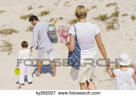 Family on vacations on the beach View Large Photo Image Stock Photo - Family on vacations on the beach. Fotosearch