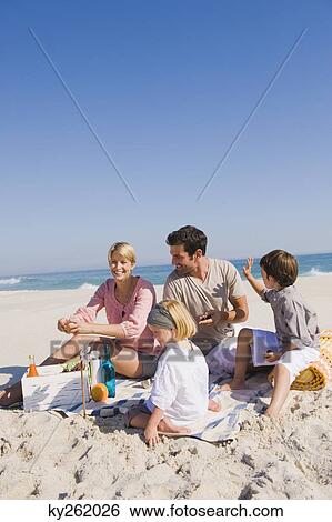 Family on vacations on the beach View Large Photo Image Stock Photograph - Family on vacations on the beach. Fotosearch