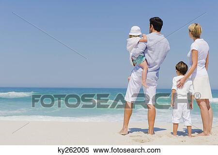 Family on vacations on the beach View Large Photo Image Stock Photography - Family on vacations on the beach. Fotosearch