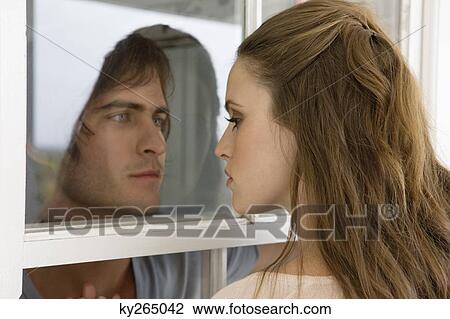 Couple looking at each other View Large Photo Image Stock Image - Couple looking at each other. Fotosearch