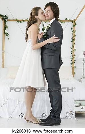 Bride kissing groom View Large Photo Image Stock Image - Bride kissing groom. Fotosearch
