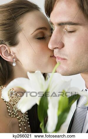 Bride kissing groom View Large Photo Image Stock Image - Bride kissing groom. Fotosearch
