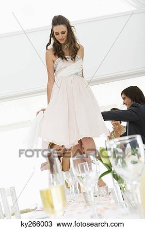 Newlywed couple with guests in a wedding party View Large Photo Image Stock Image - Newlywed couple with guests in a wedding party. Fotosearch