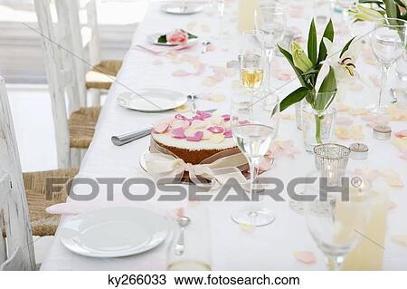 Stock Image - Wedding cake on a dining table. Fotosearch