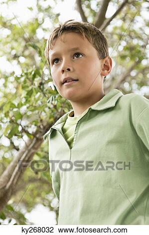 Close-up of a boy View Large Photo Image Stock Image - Close-up of a boy. Fotosearch