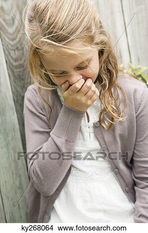 Picture - Close-up of a girl smiling. Fotosearch
