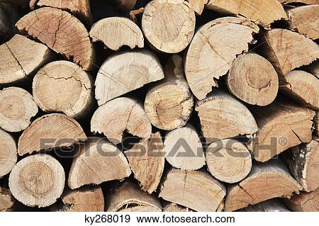 Close-up of a stack of firewood View Large Photo Image Stock Photo - Close-up of a stack of firewood. Fotosearch