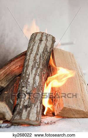 Close-up of firewood burning View Large Photo Image Stock Image - Close-up of firewood burning. Fotosearch