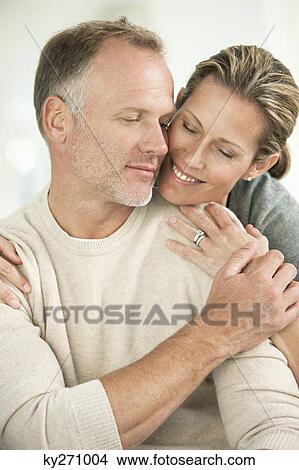 Picture - Close-up of a couple romancing. Fotosearch