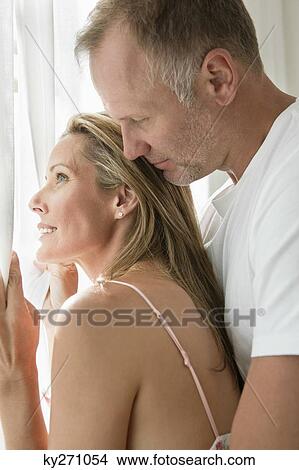 Close-up of a couple romancing View Large Photo Image Picture - Close-up of a couple romancing. Fotosearch
