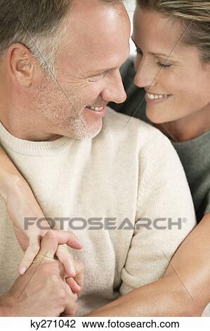Close-up of a couple romancing View Large Photo Image Stock Image - Close-up of a couple romancing. Fotosearch