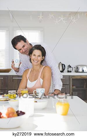 Couple having breakfast View Large Photo Image Stock Photo - Couple having breakfast. Fotosearch