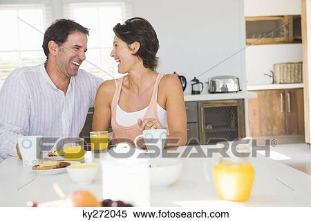 Couple having breakfast View Large Photo Image Stock Photography - Couple having breakfast. Fotosearch