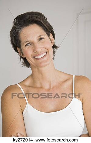 Portrait of a woman smiling View Large Photo Image Picture - Portrait of a woman smiling. Fotosearch
