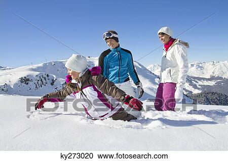 Happy family in snow View Large Photo Image Stock Image - Happy family in snow. Fotosearch