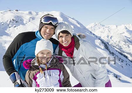 Happy family in snow View Large Photo Image Stock Photo - Happy family in snow. Fotosearch