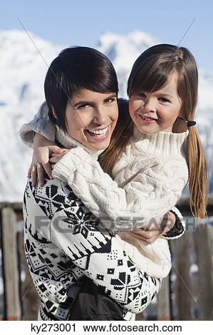 Mother and daughter hugging View Large Photo Image Stock Image - Mother and daughter hugging. Fotosearch