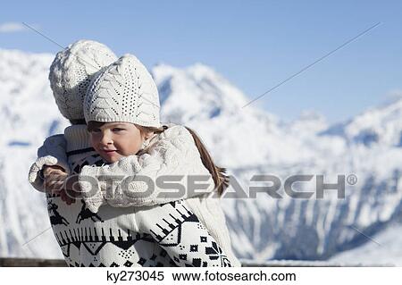 Mother and daughter hugging View Large Photo Image Stock Photography - Mother and daughter hugging. Fotosearch