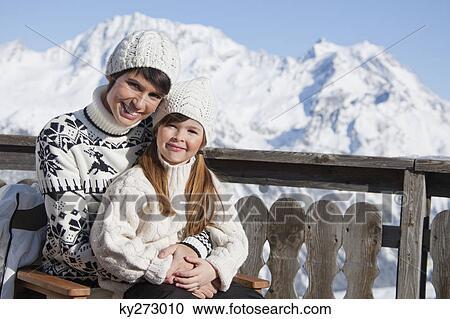 Mother and daughter on balcony at ski resort View Large Photo Image Stock Image - Mother and daughter on balcony at ski resort. Fotosearch