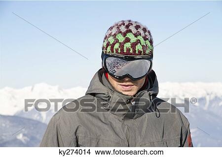 Portrait of young man with ski goggles View Large Photo Image Picture - Portrait of young man with ski goggles. Fotosearch