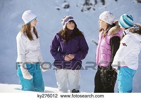 Four teenage girls in ski clothes View Large Photo Image Stock Image - Four teenage girls in ski clothes. Fotosearch