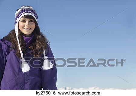 Stock Photograph - Portrait of teenage girl smiling at camera. Fotosearch